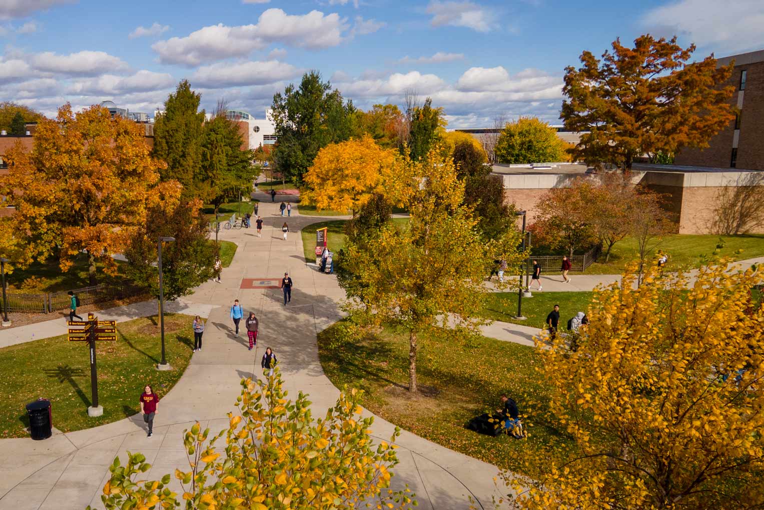 Fall Scenic of students walking around central campus