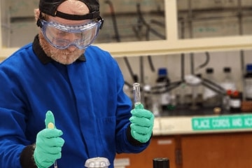 Photo of Lentz working in the lab