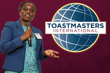 MBA student Judith Saungweme, student sponsor of Toastmasters International, gives a speech.