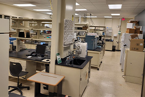 A laboratory filled with numerous computers and advanced equipment, showcasing a high-tech research environment.