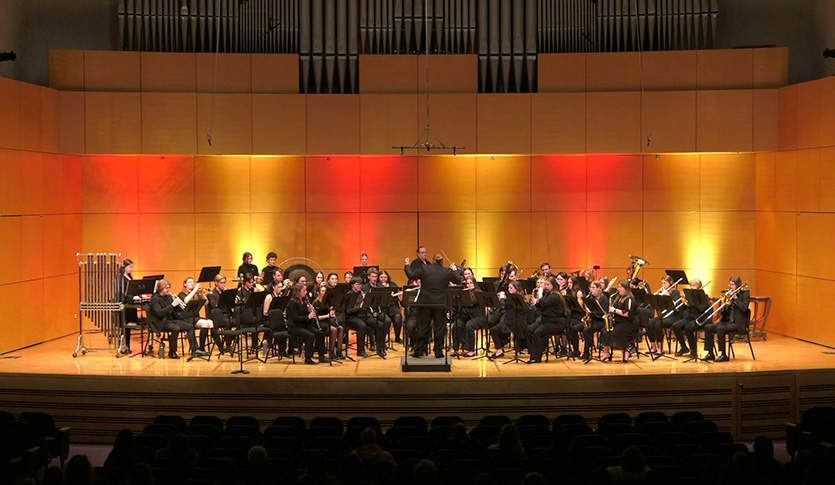 The CMU University Band performing in Staples Hall.