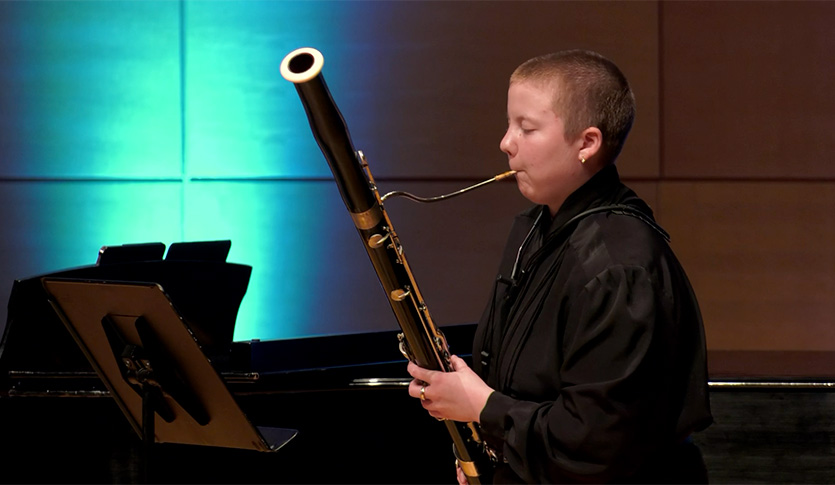 Bassoonist playing in Staples Family Concert Hall