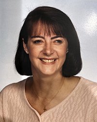 Headshot of Susan Rozman Delia set in front of a white backdrop.