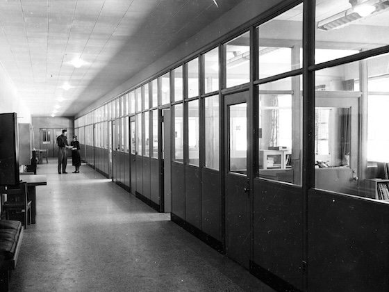 Black and white photo of the hallway of historic Finch Fieldhouse.