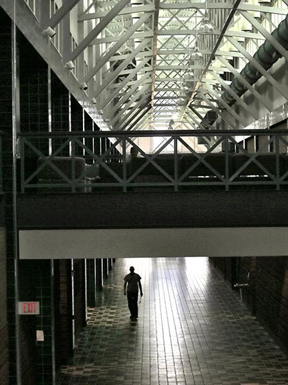 a person walking in a hallway