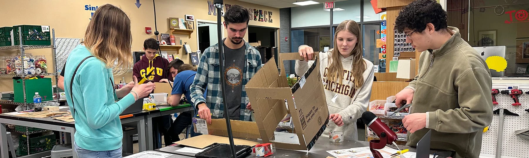 A group of InSciTe students work together in an active learning classroom.