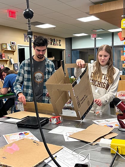 A group of InSciTe students work together in an active learning classroom.