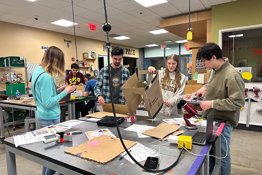 A group of InSciTe students work together in an active learning classroom.