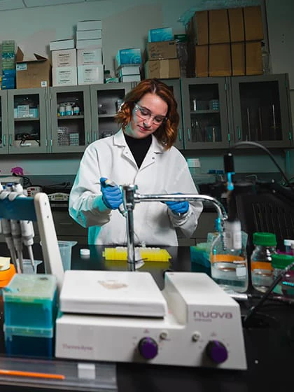 A pre-dentistry student works in a lab on Central Michigan University's campus.