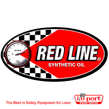 A red and black oval sign with a gauge and white text, a logo for Red Line Oil.