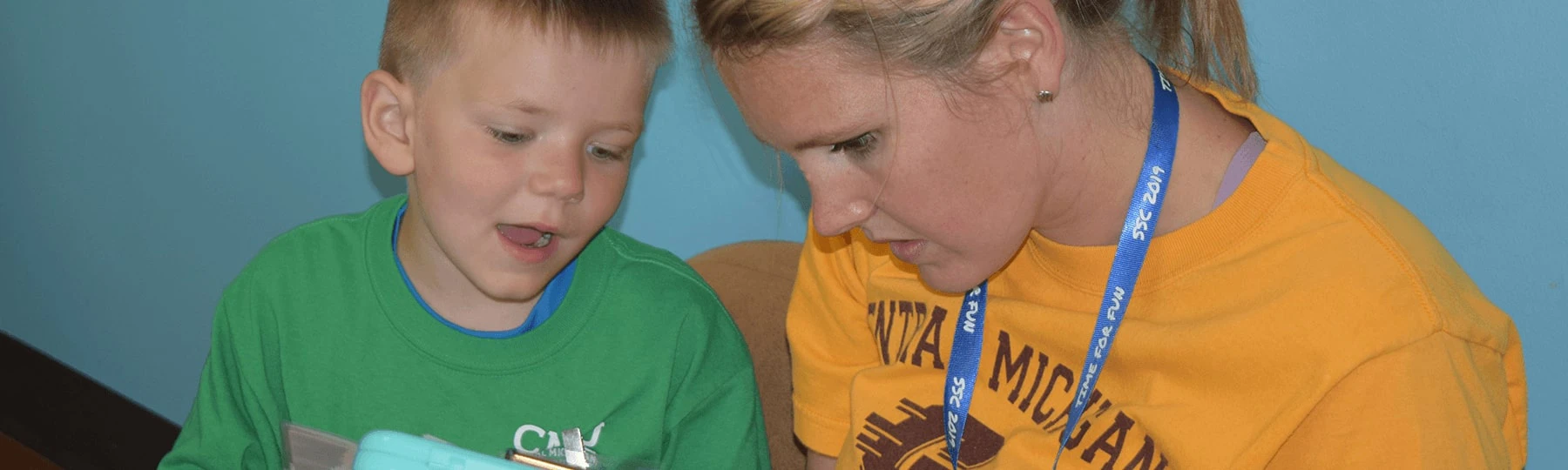 Student reading to a child