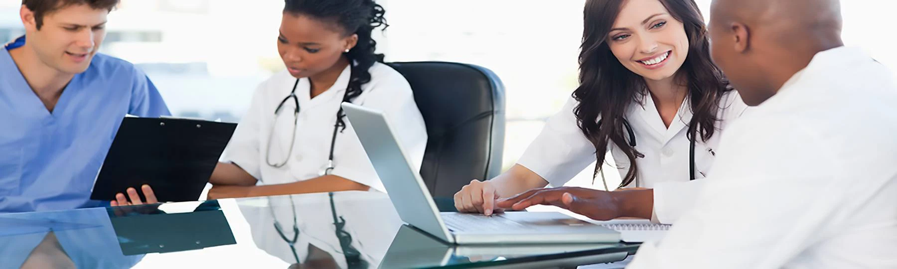 Health Professions students at a conference table