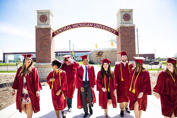 Graduates walking on campus