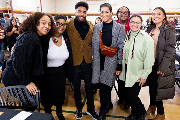 The staff of the Office for Diversity, Equity, and Inclusion at Central Michigan University pose together for a picture at the annual MLK CommUNITY Peace Brunch