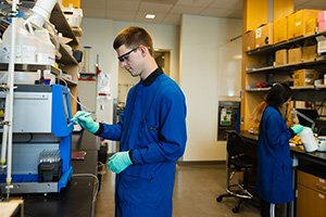 Two biochemistry students work on a project in one of Central Michigan University's labs.