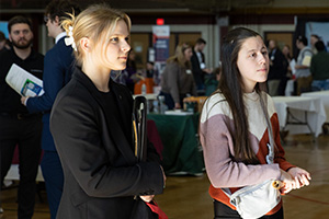 a group of people standing in a room