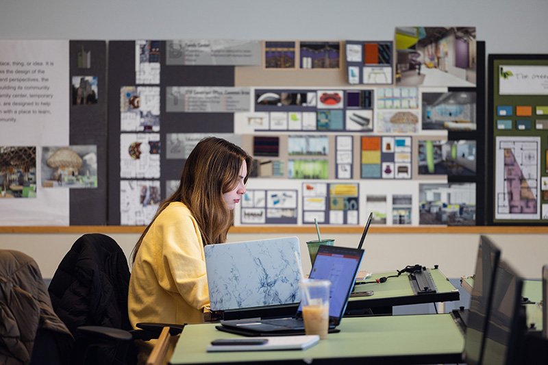 CMU interior design student working in classroom