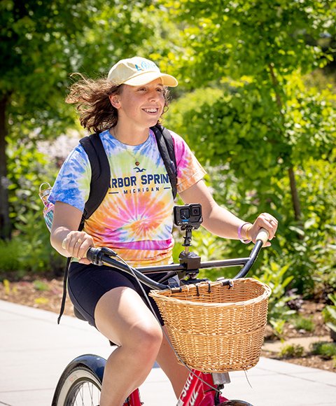 Student Hannah Ardelean rides the local trails through Mt. Pleasant.