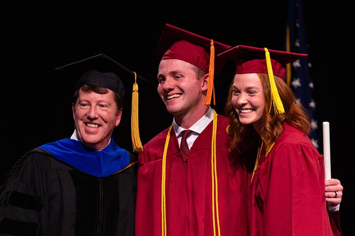 CMU graduates pose for a photo during commencement.