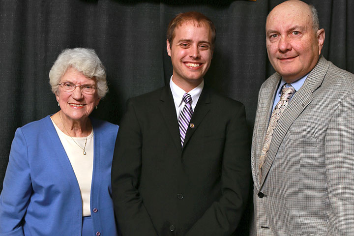 Philip Kintzele, emeritus professor of accounting, pictured with Ms. Louise Plachta and scholarship recipient Ryan Maurer at a 2014 scholarship event.
