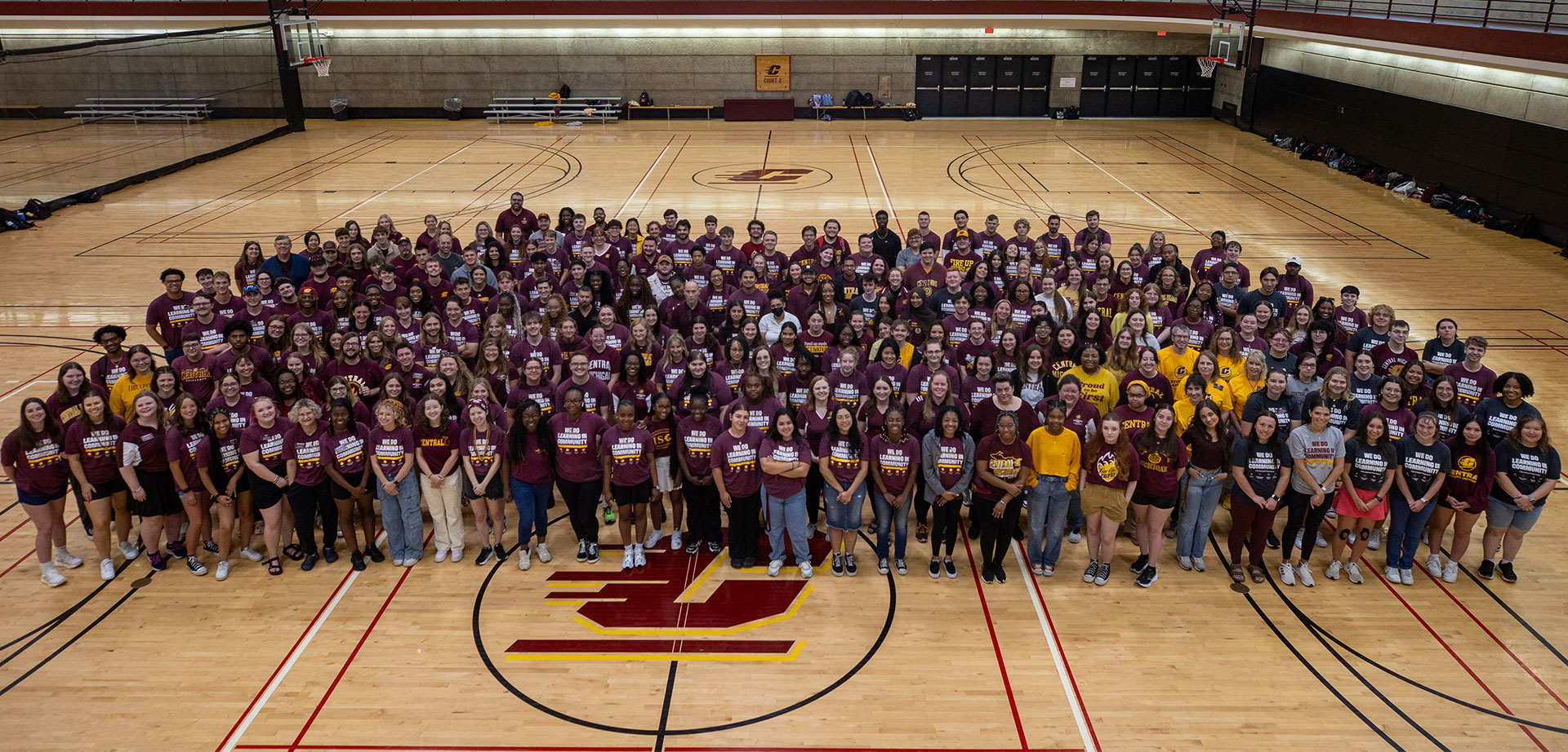 A large group of resident life staff posing for a photo.