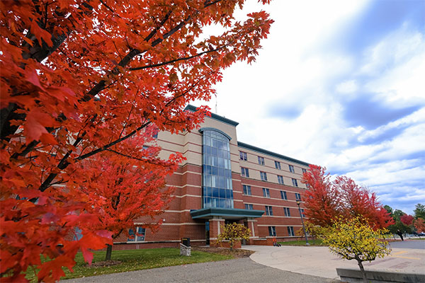 Exterior shot of the Towers Community with fall foliage