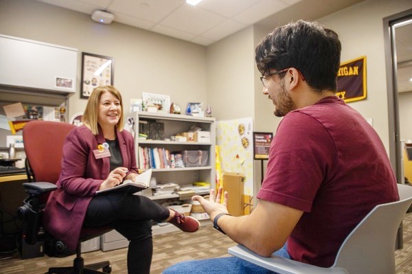 CMU academic advisor providing guidance to a student.