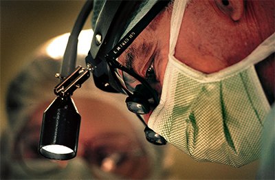 a close-up of a doctor wearing a mask