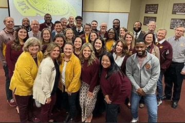 CMU Alumni Board of Directors along with CMU staff members during a meeting in October 2023.