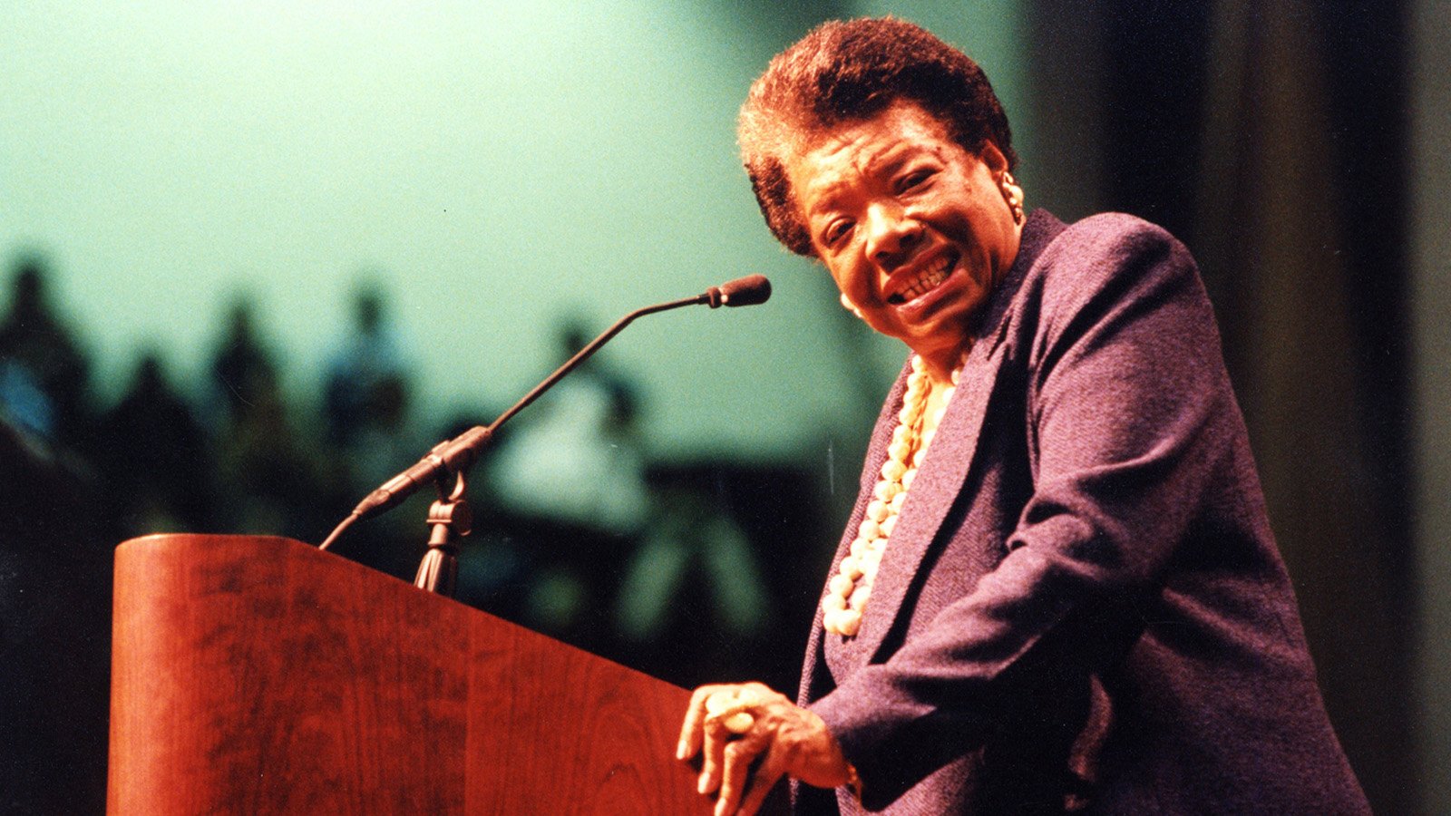 Maya Angelou speaks at a podium